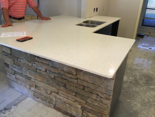 Need help with backsplash for kitchen remodel - The kitchen has a more modern countertop (quartz stellar snow), but our  flooring will be kind of vintage.