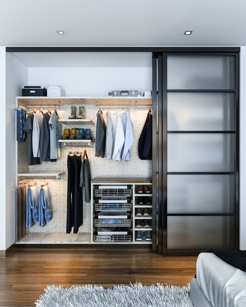 Imagen de armario y vestidor minimalista de tamaño medio