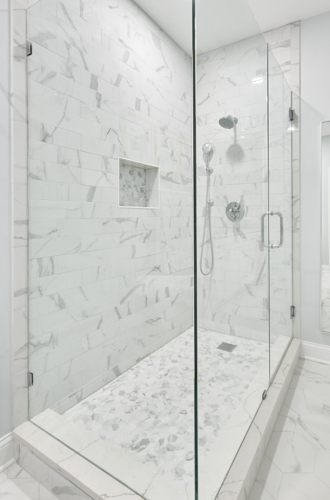 Mid-sized transitional master wet room bathroom in Chicago with recessed-panel cabinets, white cabinets, a freestanding tub, white tile, porcelain tile, white walls, quartzite benchtops, white floor, a hinged shower door, white benchtops, a niche, a double vanity and a freestanding vanity.