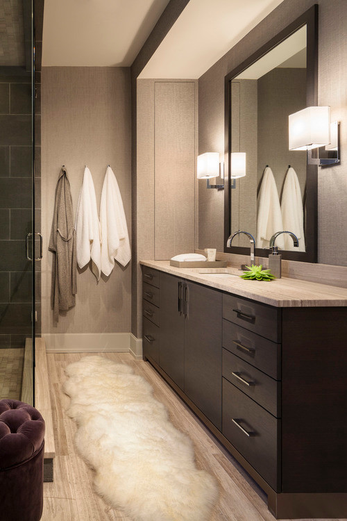 Inspiration for a mid-sized modern master bathroom in Chicago with flat-panel cabinets, dark wood cabinets, an open shower, grey walls, porcelain floors, an undermount sink and soapstone benchtops.