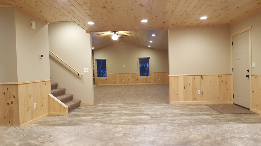 Example of a mountain style home design design in Minneapolis