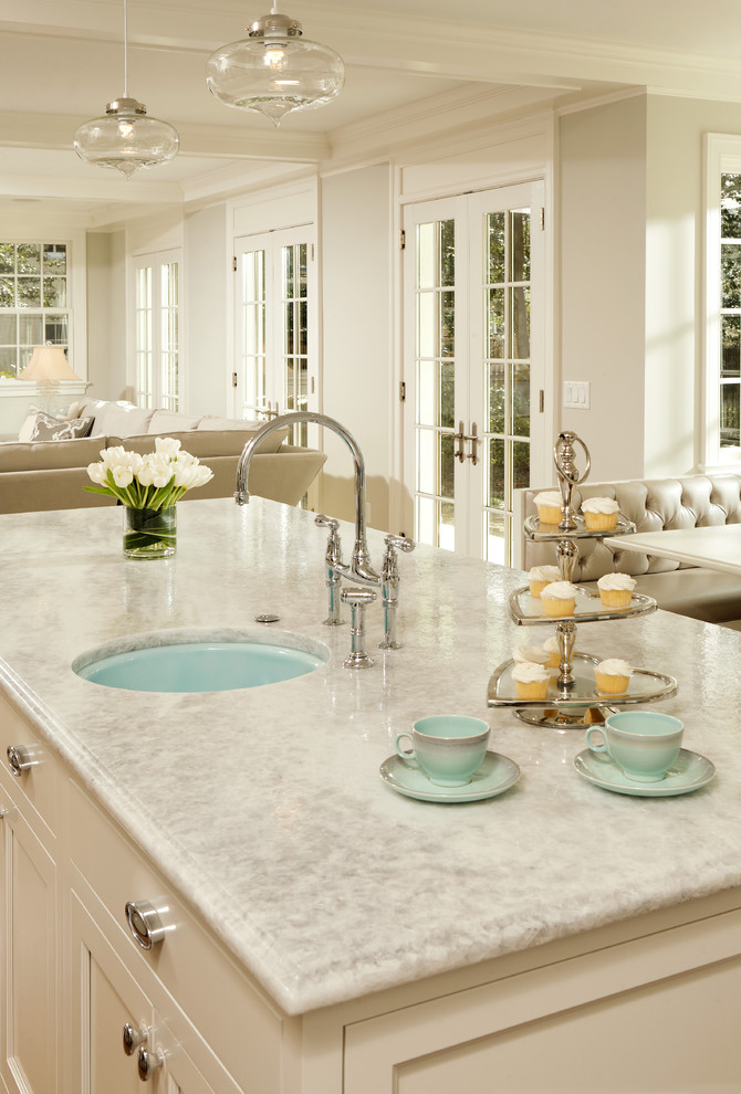 Photo of a traditional kitchen in DC Metro with quartzite benchtops.