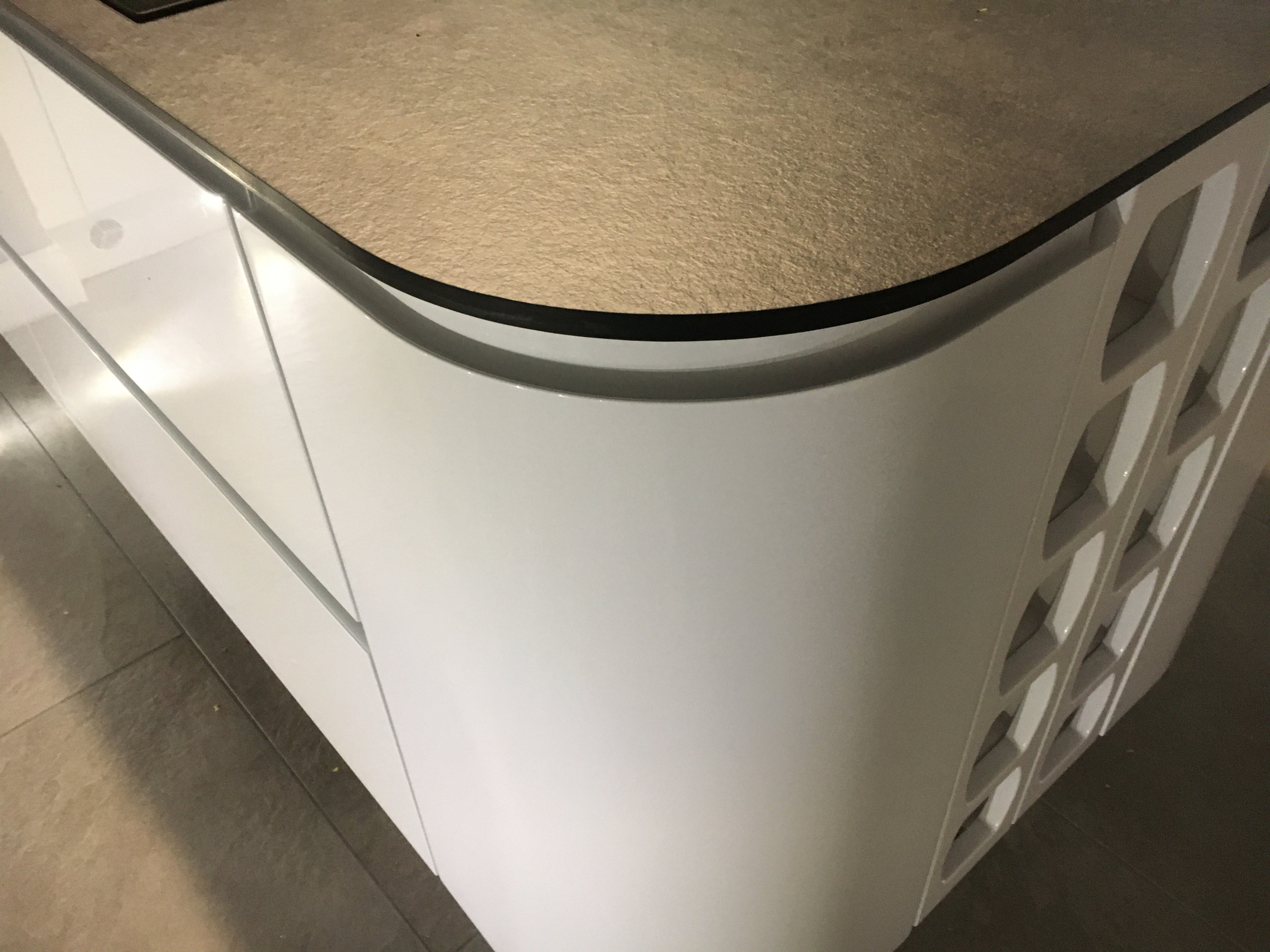 J pull handle Kitchen with compact laminate and porcelain floor tiles
