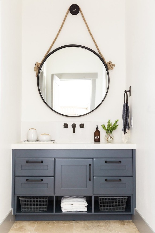 Inspiration for a transitional powder room in Salt Lake City with grey cabinets, white walls and beige floor.