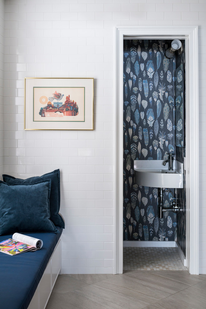 Small traditional 3/4 bathroom in New York with beaded inset cabinets, stone tile, blue walls, mosaic tile floors, a console sink and beige floor.