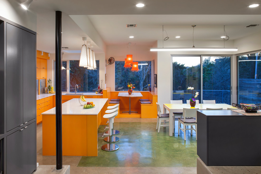 Contemporary kitchen/dining combo in Austin with white walls, ceramic floors, no fireplace and green floor.