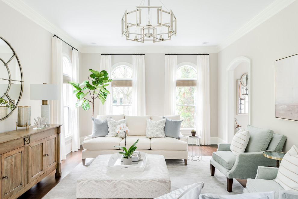Inspiration for a traditional enclosed living room in Charlotte with grey walls, dark hardwood floors and brown floor.