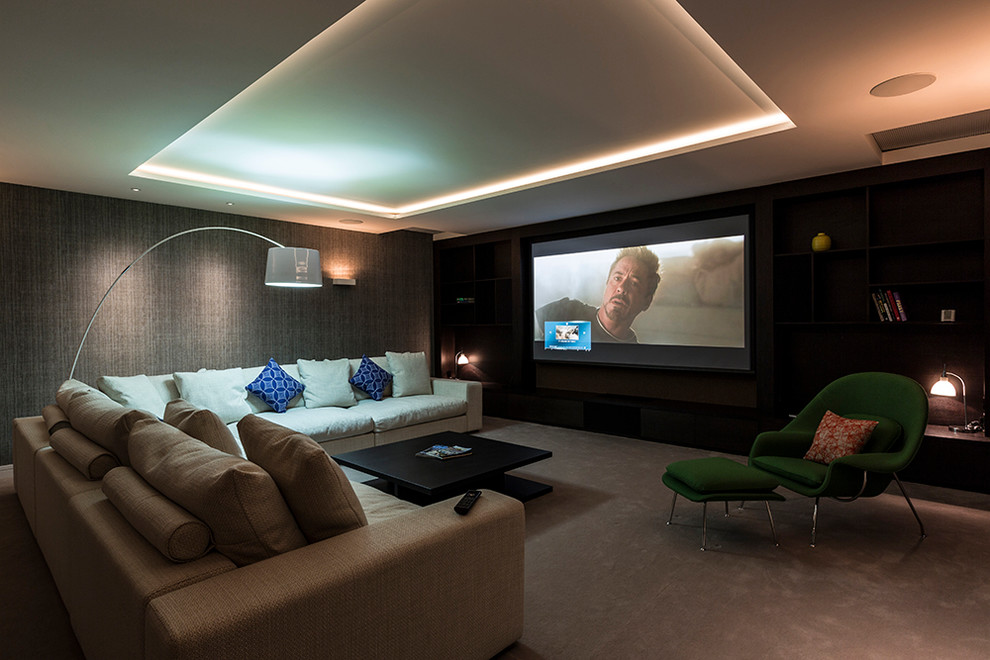 Example of a trendy home theater design in Surrey