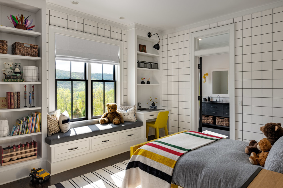 Design ideas for a large country kids' bedroom for kids 4-10 years old and boys in New York with white walls, dark hardwood floors and brown floor.
