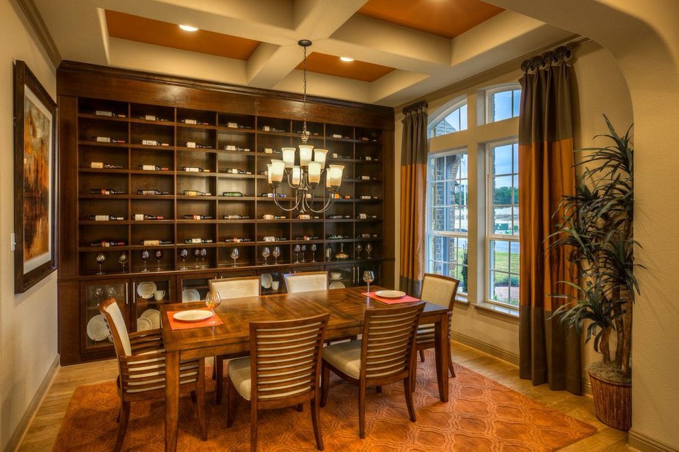 Great room - large transitional light wood floor great room idea in Austin with beige walls