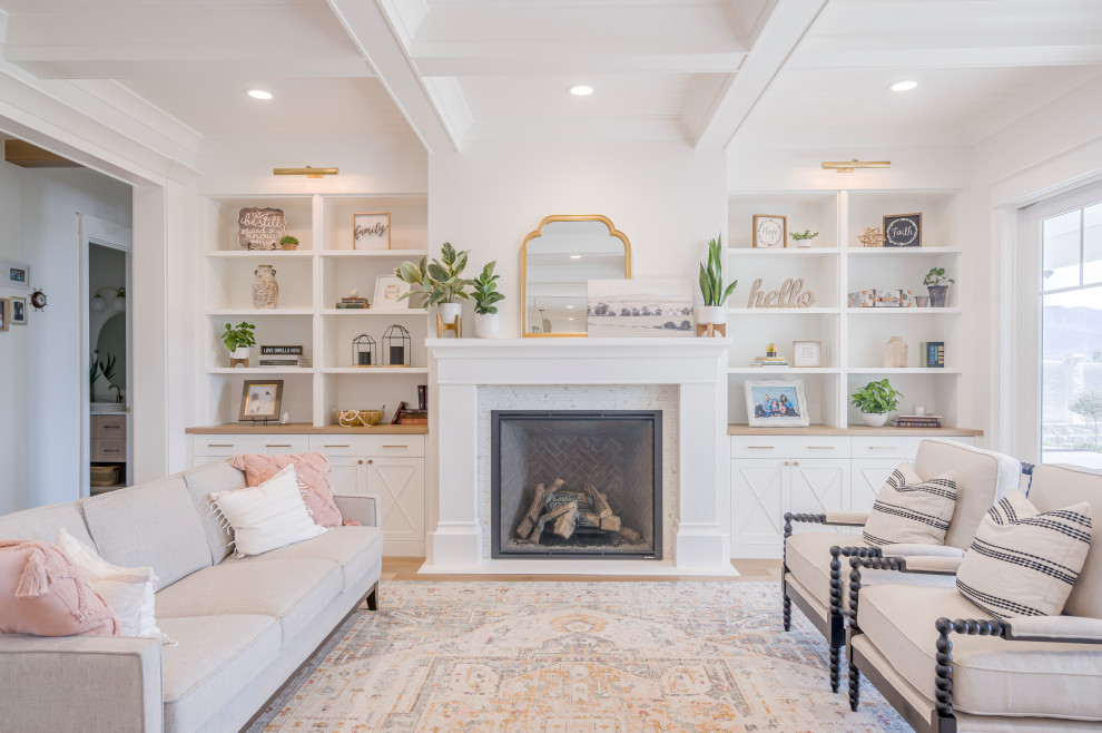 Design ideas for a transitional formal enclosed living room in Salt Lake City with white walls, medium hardwood floors, a standard fireplace, a stone fireplace surround, no tv, brown floor and coffered.