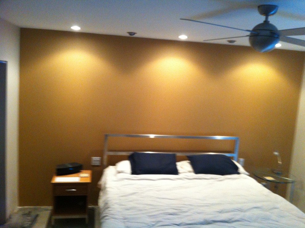 Placement of art behind bed