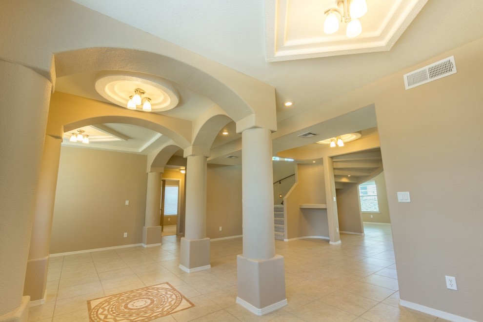 Example of a transitional home design design in Austin