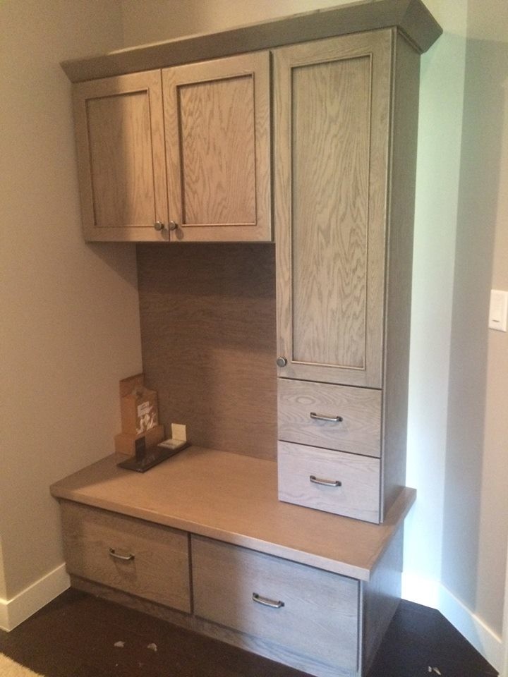 Inspiration for a small rustic mudroom remodel in Cedar Rapids
