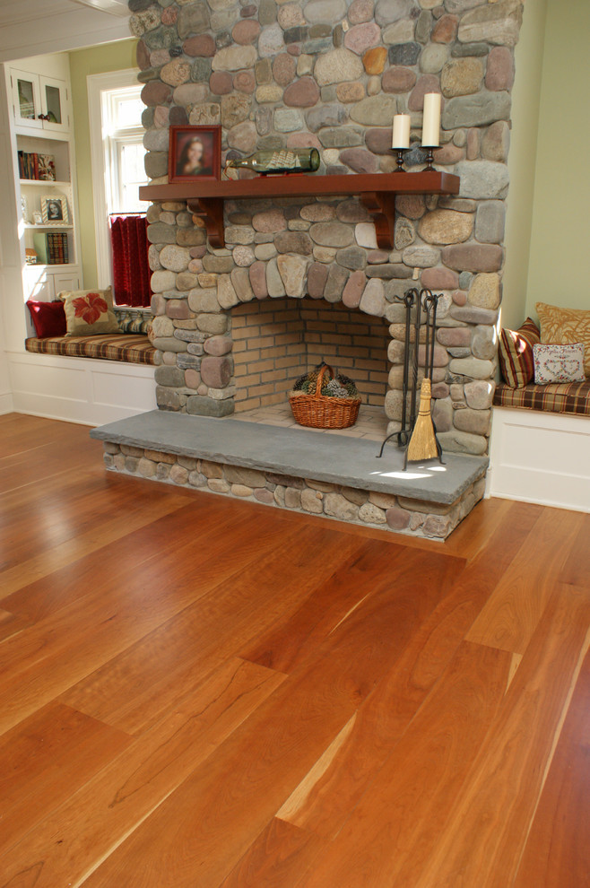 Inspiration for a traditional living room in Boston with medium hardwood floors.