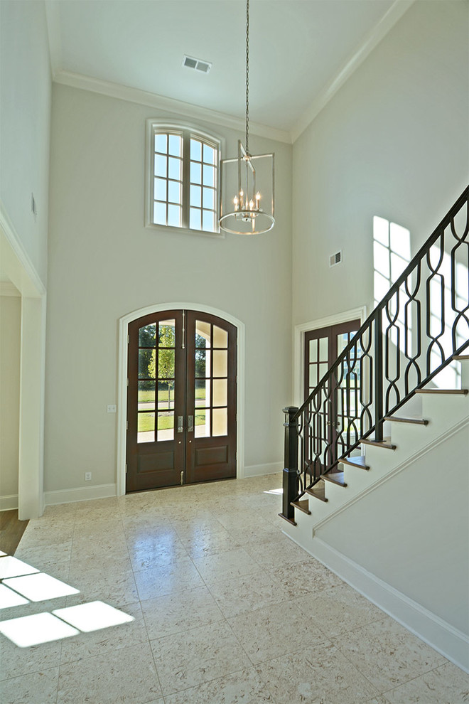 Foyer - mid-sized transitional porcelain tile and white floor foyer idea with gray walls and a glass front door