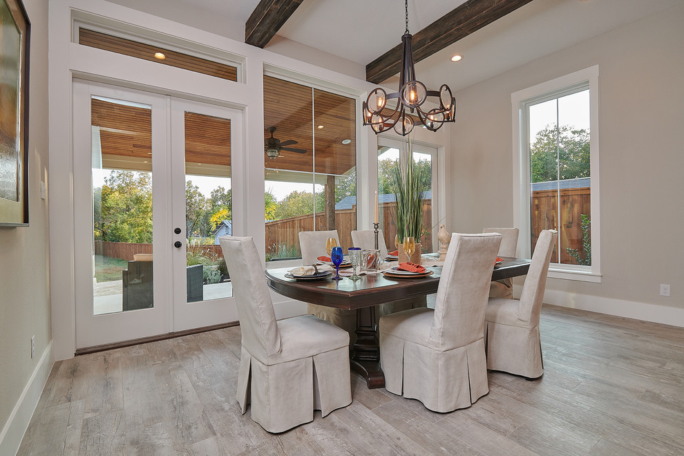 Large country open plan dining in Dallas with grey walls, porcelain floors and grey floor.