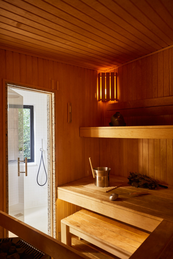Bild på ett litet skandinaviskt fristående gästhus