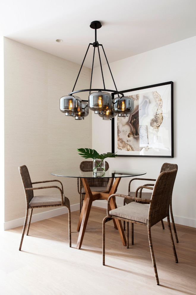 Inspiration for a mid-sized contemporary dining room in Melbourne with white walls and medium hardwood floors.