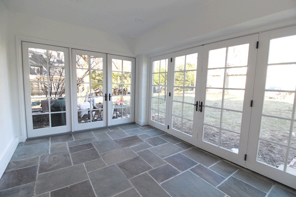 Inspiration for a large traditional sunroom in Philadelphia with slate floors, no fireplace, a standard ceiling and white floor.