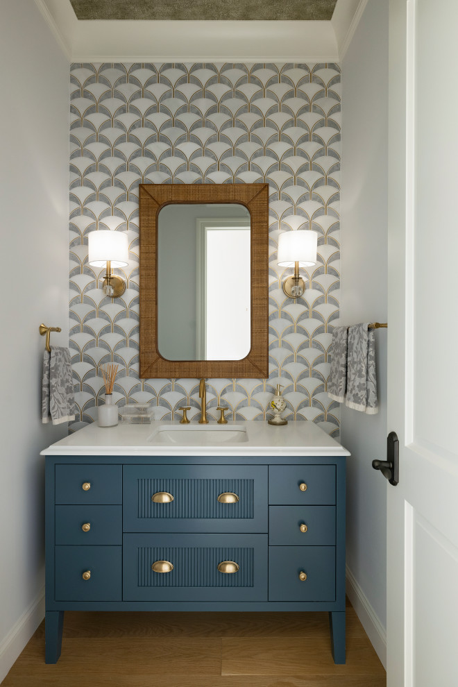 Example of a transitional powder room design in Minneapolis