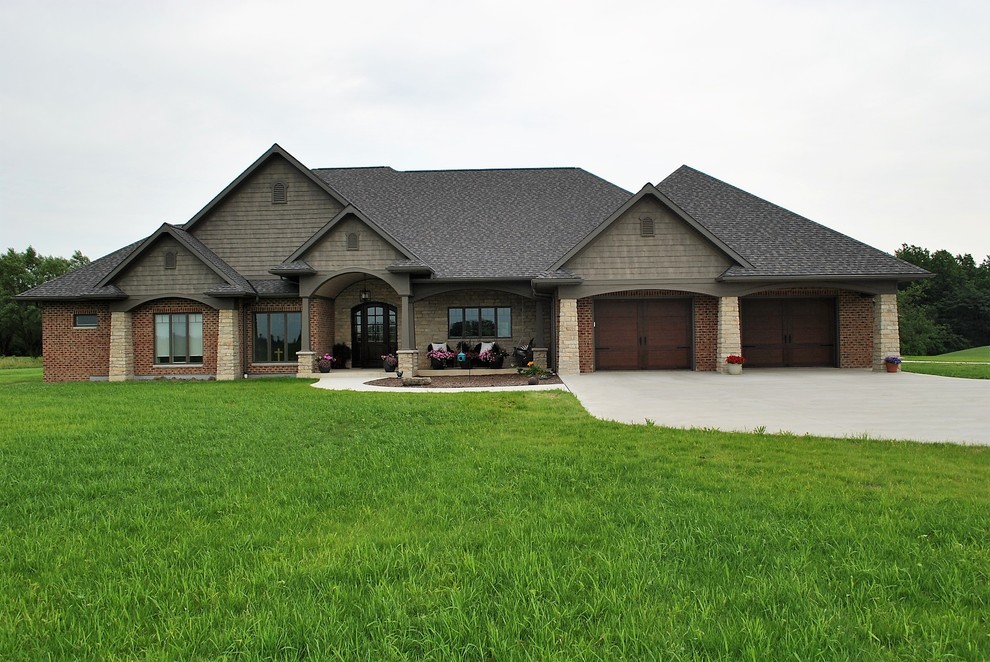One-story brick house exterior photo in Other with a shingle roof