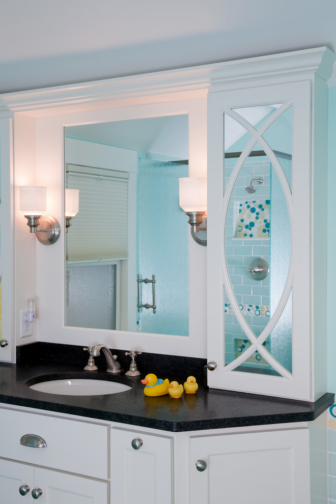 Inspiration for a large transitional kids' blue tile and ceramic tile porcelain tile alcove bathtub remodel in Minneapolis with flat-panel cabinets, white cabinets, blue walls, an undermount sink and granite countertops