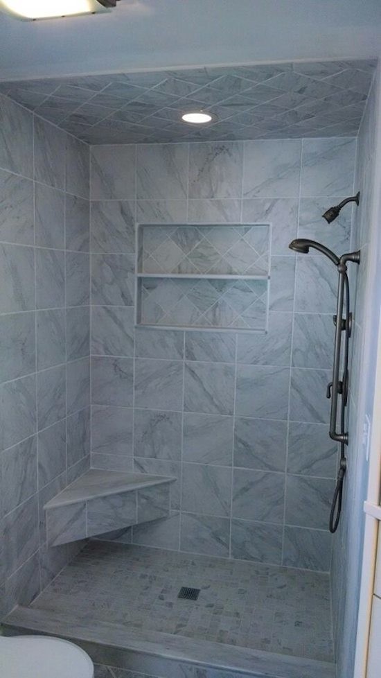 Photo of a large master bathroom in Philadelphia with tile benchtops, a drop-in tub, a corner shower, a one-piece toilet, multi-coloured tile, ceramic tile, purple walls and ceramic floors.