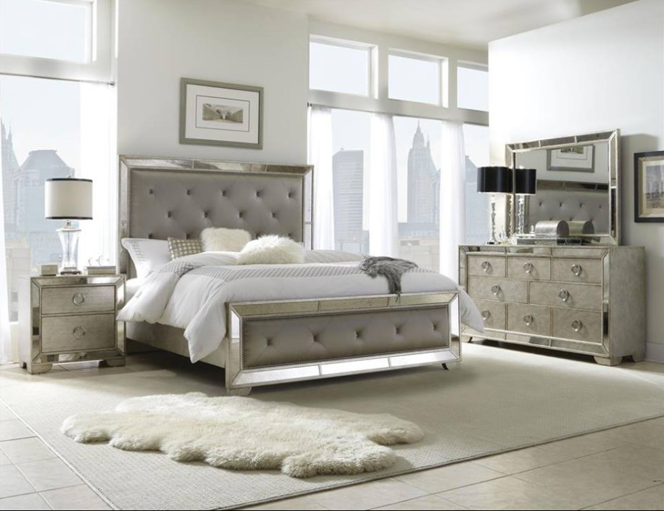 Design ideas for a mid-sized transitional master bedroom with white walls, ceramic floors, no fireplace and grey floor.