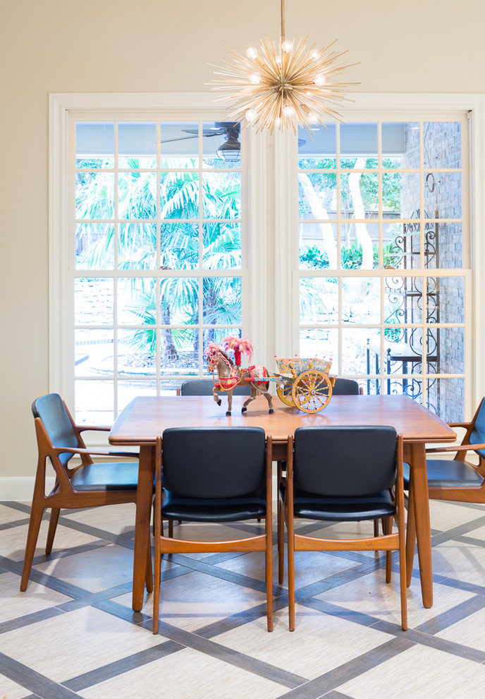 Inspiration for a large transitional kitchen/dining room combo remodel in Austin with beige walls