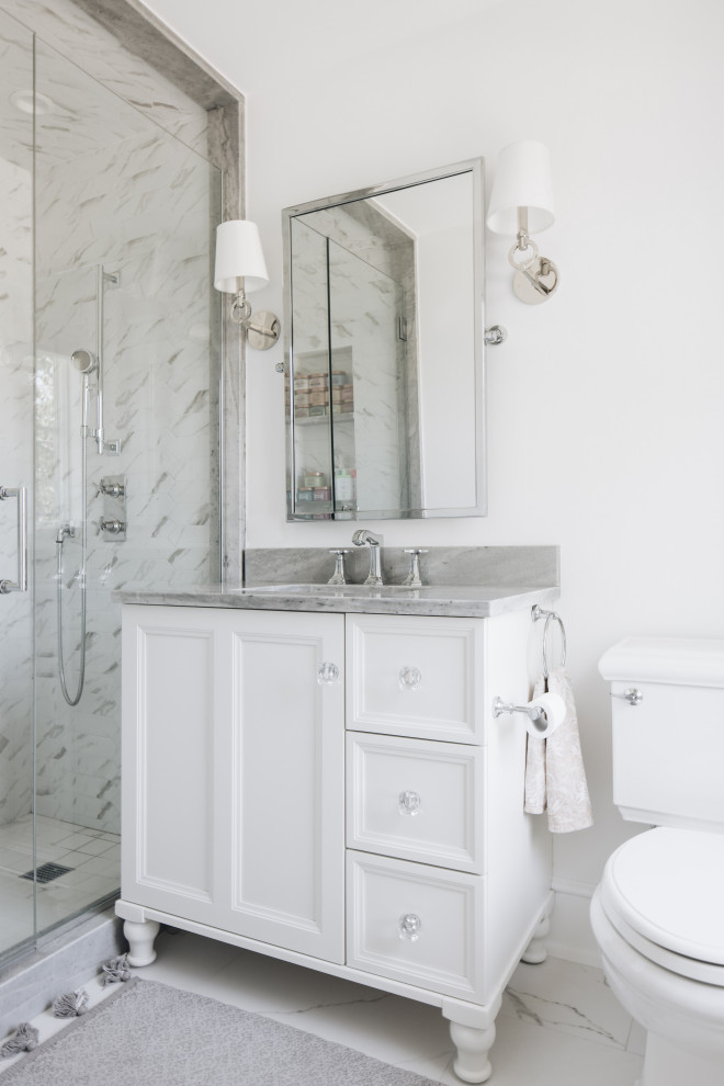 South Coast Farmhouse - White and gray teen bathroom with glass-enclosed shower.