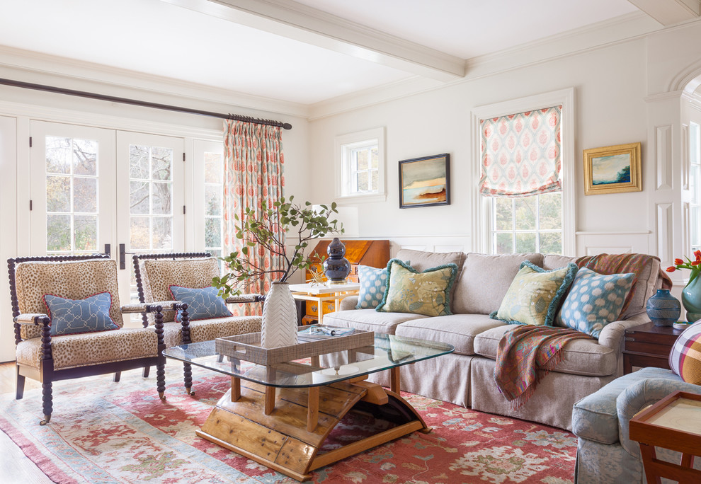 Inspiration for a mid-sized traditional living room in Boston with white walls.