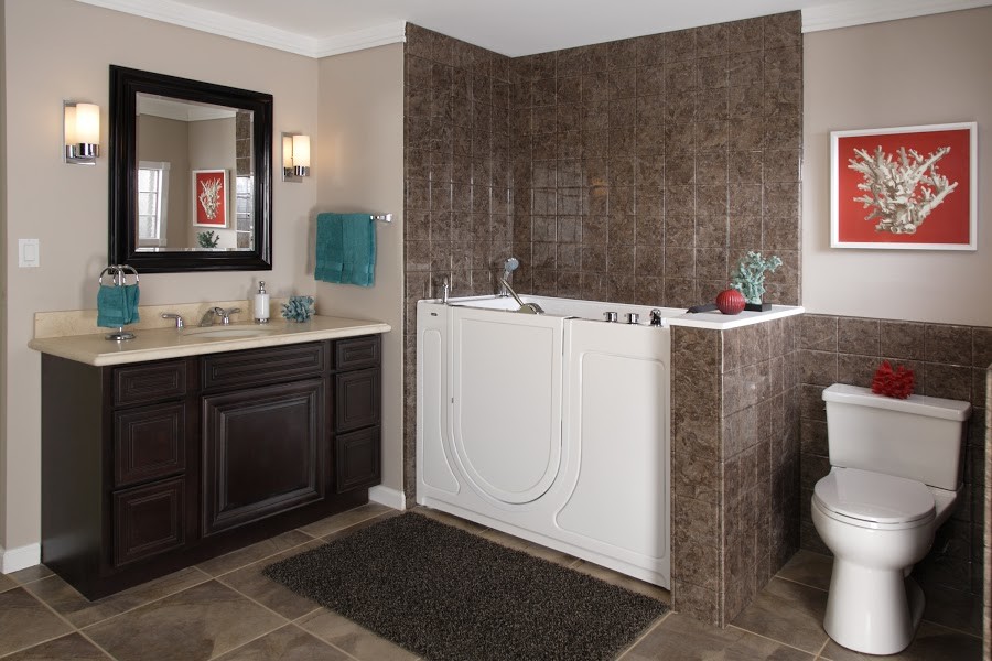 Design ideas for a mid-sized traditional master bathroom in Wichita with recessed-panel cabinets, dark wood cabinets, a japanese tub, an alcove shower, a two-piece toilet, brown tile, ceramic tile, beige walls, ceramic floors, an undermount sink and solid surface benchtops.