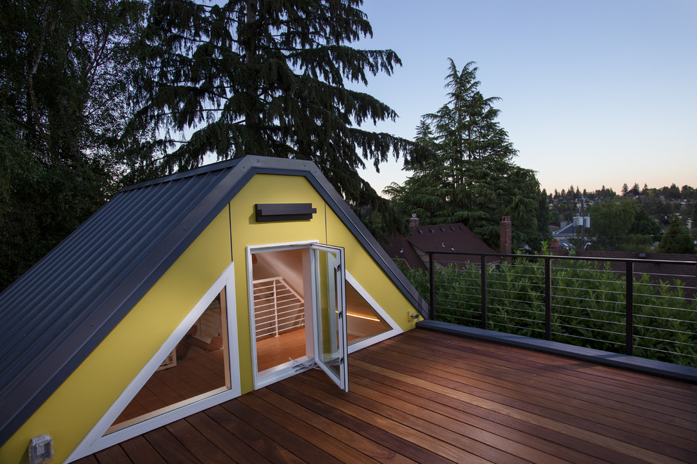 This is an example of a small modern rooftop deck in Seattle with no cover.