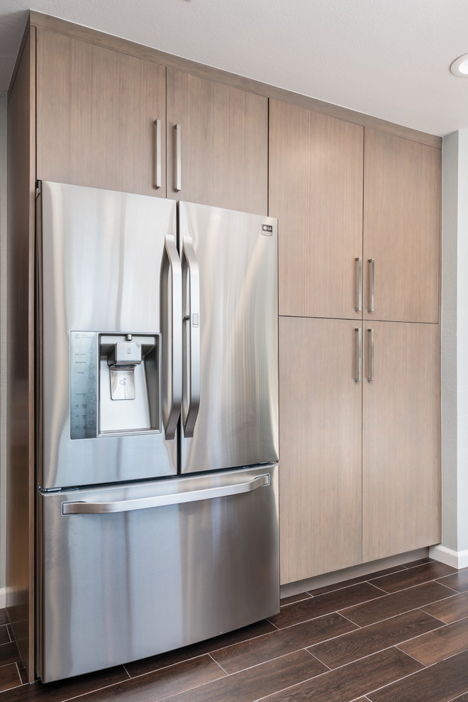 Example of a small transitional u-shaped ceramic tile open concept kitchen design in San Francisco with a double-bowl sink, flat-panel cabinets, gray cabinets, marble countertops, blue backsplash, glass tile backsplash, stainless steel appliances and a peninsula