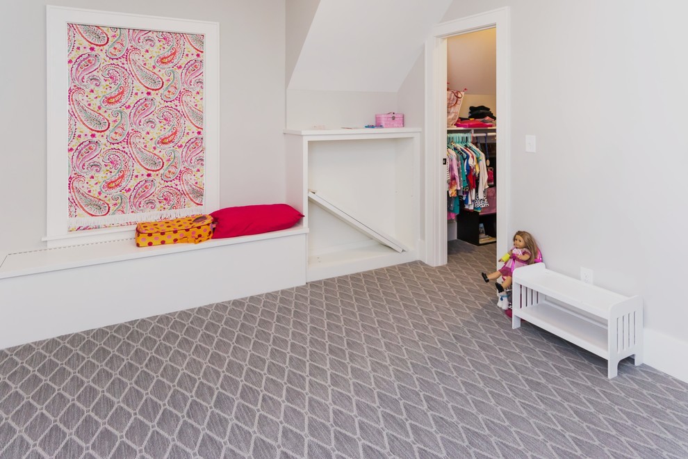 Design ideas for a mid-sized transitional kids' bedroom for kids 4-10 years old and girls in Minneapolis with carpet, grey walls and grey floor.