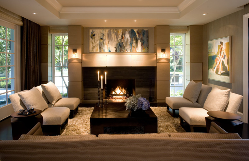 Transitional home theatre in San Francisco with dark hardwood floors, a built-in media wall and black floor.