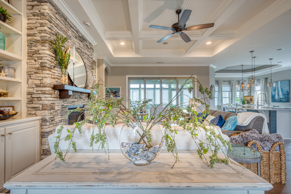 This is an example of a beach style living room in Other.