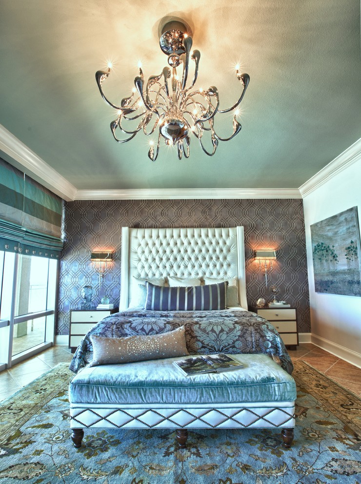 Inspiration for a large beach style master bedroom in Miami with grey walls and ceramic floors.
