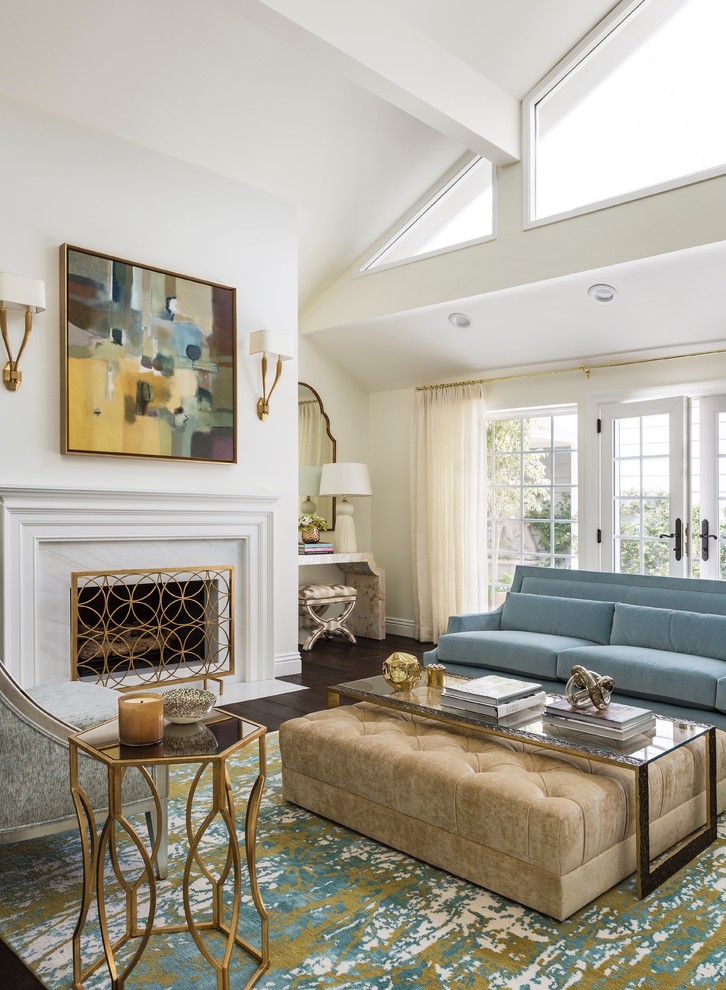 Living room - transitional formal dark wood floor living room idea in Los Angeles with white walls, a standard fireplace and a stone fireplace