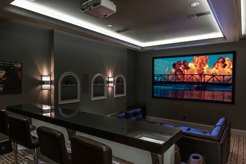 Transitional enclosed home theatre in Dallas with grey walls, carpet and a projector screen.