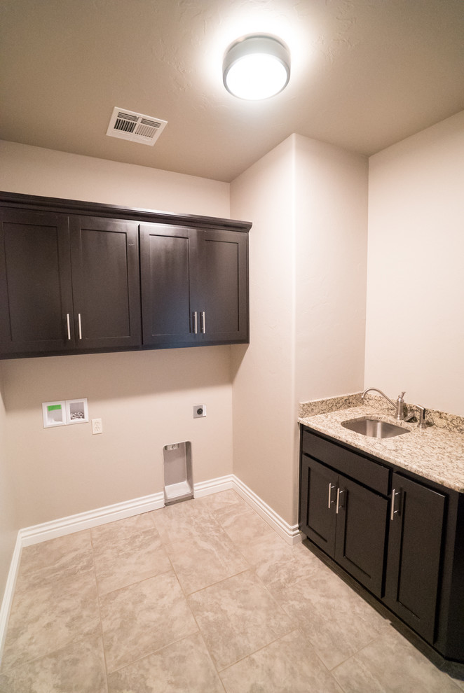 Transitional laundry room photo in Oklahoma City