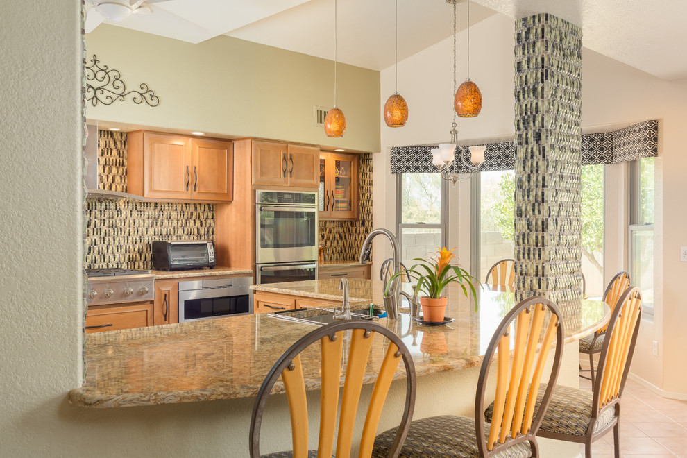 Example of a mid-sized trendy u-shaped porcelain tile open concept kitchen design with an undermount sink, recessed-panel cabinets, light wood cabinets, granite countertops, multicolored backsplash, glass tile backsplash, stainless steel appliances and an island