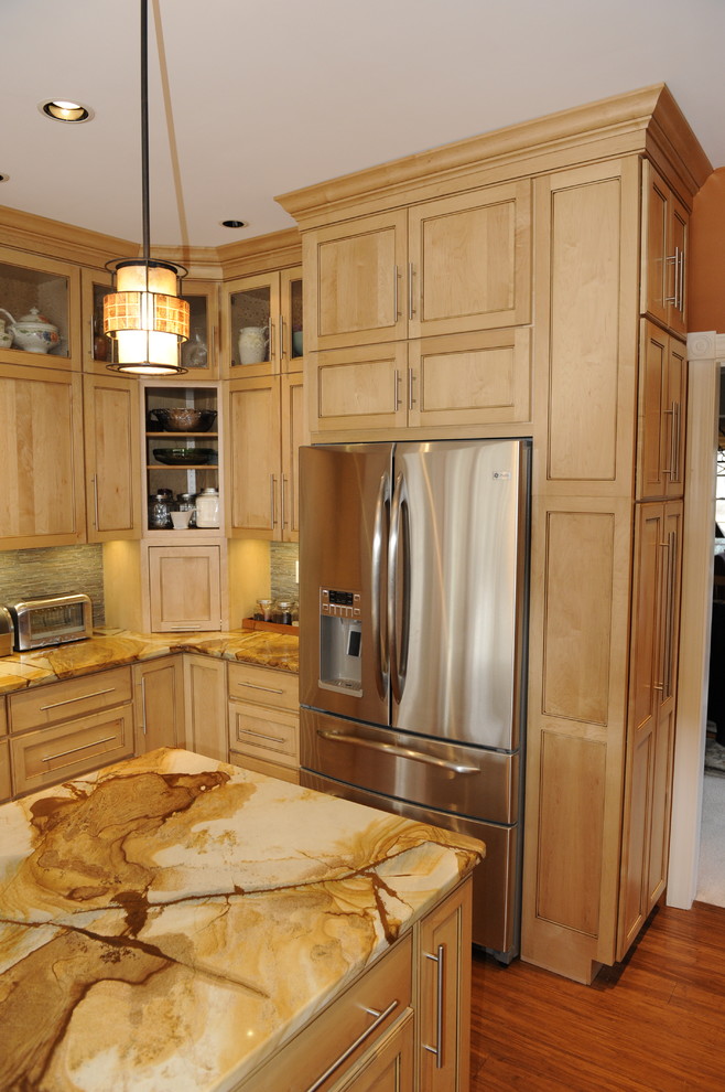 Mid-sized transitional u-shaped light wood floor eat-in kitchen photo in Baltimore with a farmhouse sink, beaded inset cabinets, light wood cabinets, onyx countertops, stainless steel appliances and an island