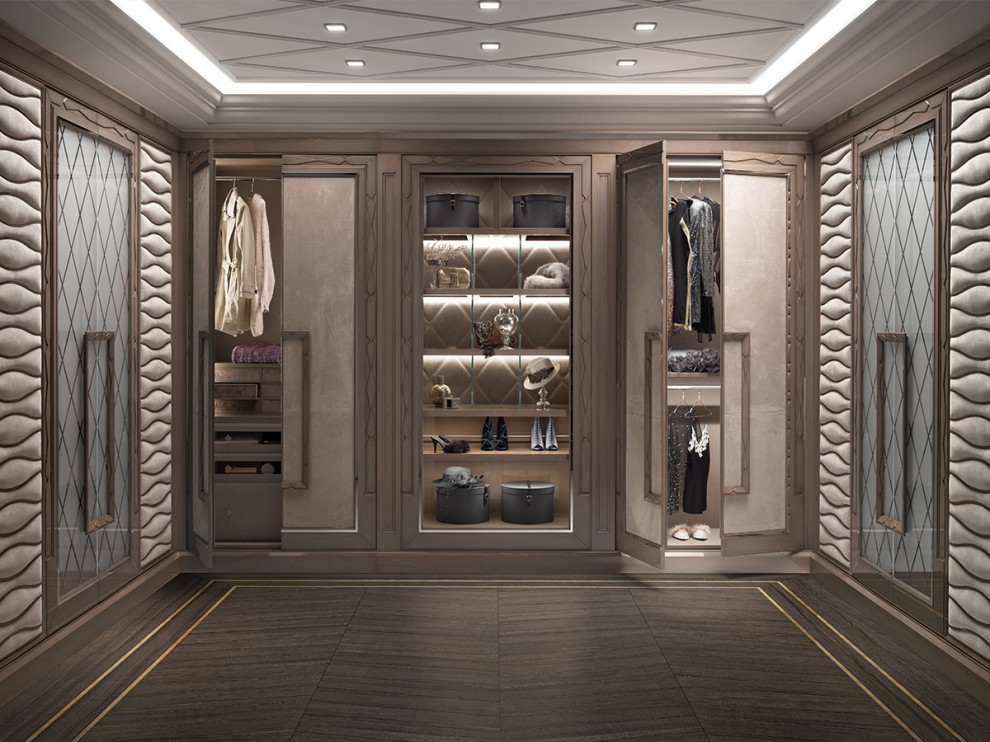 This is an example of a medium sized gender neutral walk-in wardrobe in New York with dark hardwood flooring, brown floors and a wood ceiling.