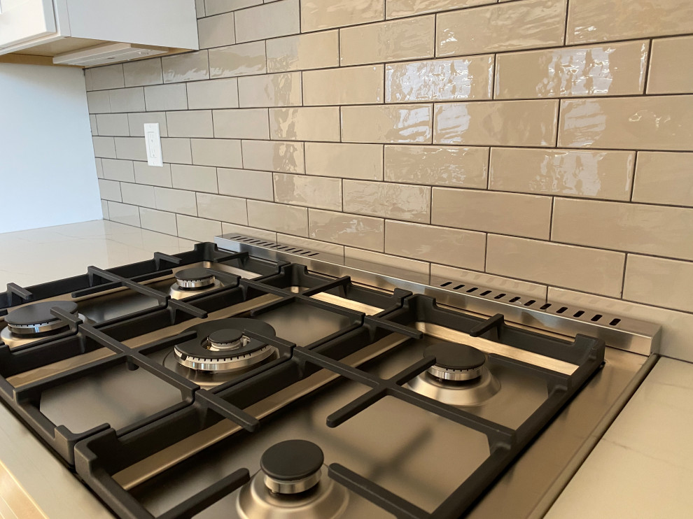 Example of a transitional kitchen design in Boston