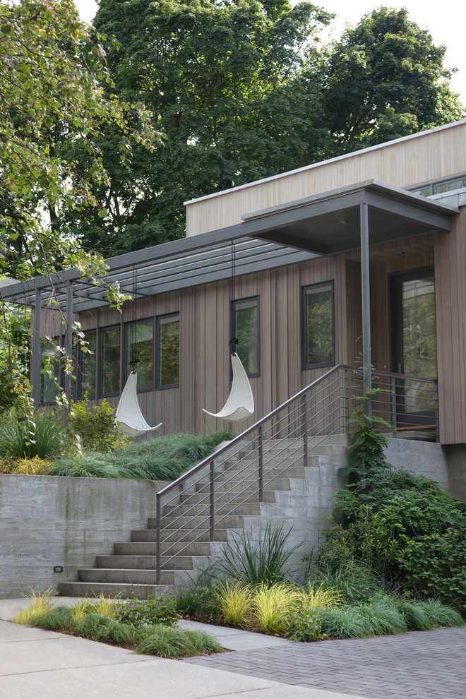 Design ideas for a contemporary sloped garden in Boston.