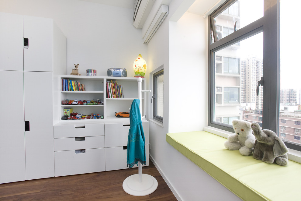 Design ideas for a contemporary kids' room in Hong Kong with white walls.