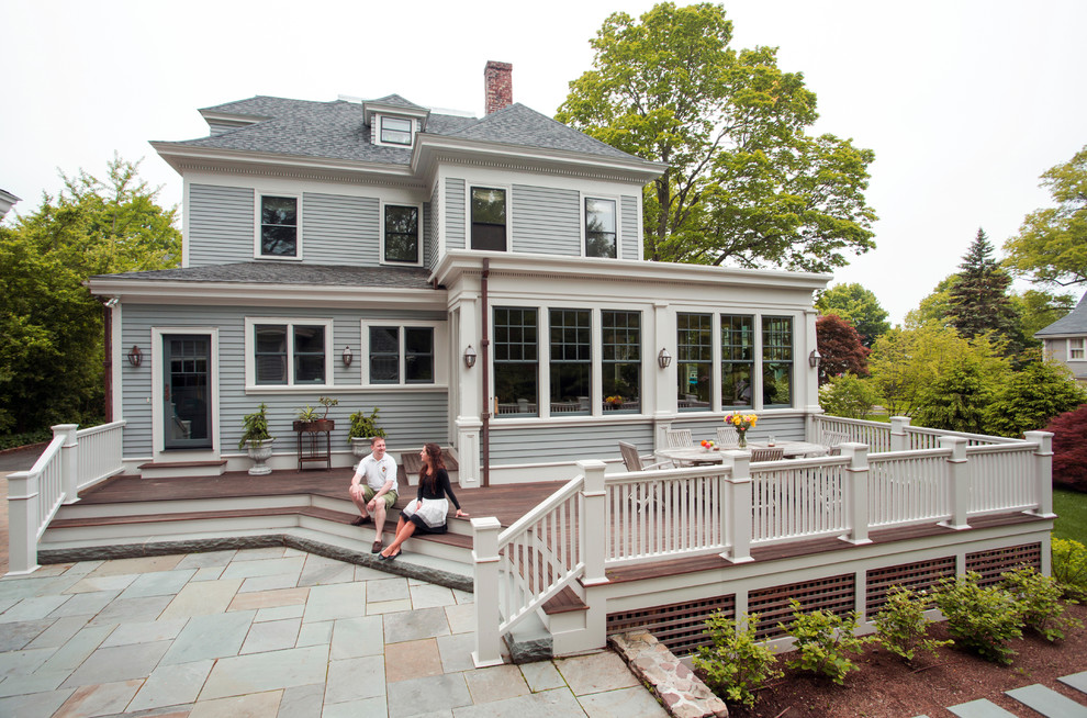Photo of a mid-sized traditional two-storey grey exterior in Boston with wood siding.
