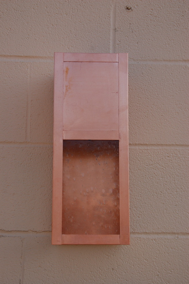 Raw copper Dark Sky compliant wall sconce